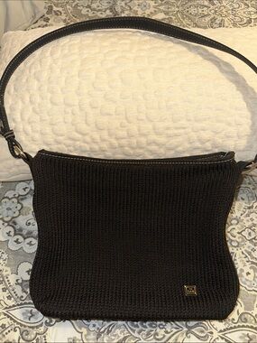 The Sak Black Exterior with Teal and Lime Checkerboard Lining Shoulder Bag